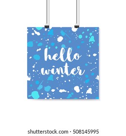 Hello winter - quote on snow background. Vector poster mockup on white wall with paper clips. Hand drawn isolated elements.
