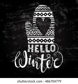 Hello winter text and knitted woolen mitten with heart. Seasonal shopping concept design for the banner or label. Stylized drawing chalk on blackboard. Isolated vector illustration.