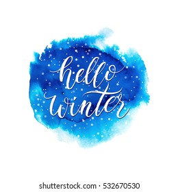 Hello winter text on blue watercolor blot isolated on white background, winter lettering on hand painted vector watercolour stain for card, poster, banner, print