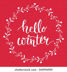 Hello winter text on red knit texture background. Winter season cards, december typography  greetings for social media. Vector lettering