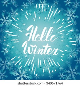 Hello winter text. Vector Brush lettering Hello Winter. Vector card design with custom calligraphy. Winter season cards, greetings for social media.