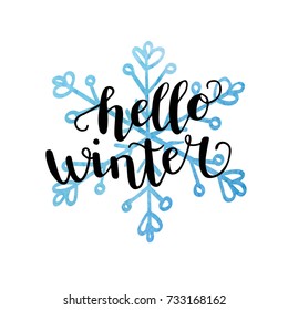 Hello winter. Vector illustration with hand lettering. Modern brush pen calligraphy and hand drawn snowflake with bright blue texture isolated on white background. Seasonal card, banner, poster design