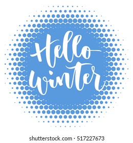 Hello winter white hand written inscription on blue round halftone background