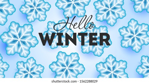 Papel tapiz de invierno con tipografía e ilustraciones de copos de nieve sobre el fondo de hielo azul