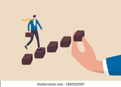 Helping hand to support on career development, staircase or ladder of success concept, confidence businessman in suit walking with ambition on wooden stair with human hand help make rising stairway.