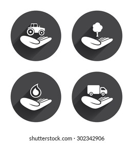 Helping hands icons. Agricultural tractor insurance symbol. Delivery truck sign. Save nature forest. Water drop. Circles buttons with long flat shadow. Vector