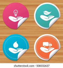 Helping hands icons. Protection and insurance.