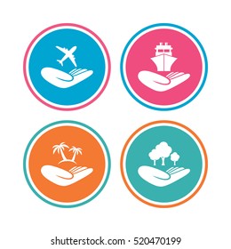 Helping hands icons. Travel flight or shipping insurance symbol. Palm tree sign. Save nature forest. Colored circle buttons. Vector