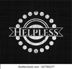 Helpless written on a blackboard