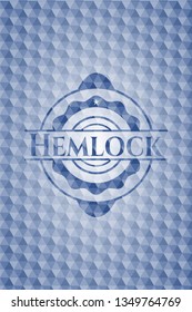 Hemlock blue badge with geometric background.