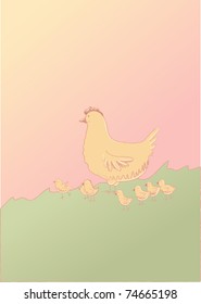 Hen with chickens on the grass