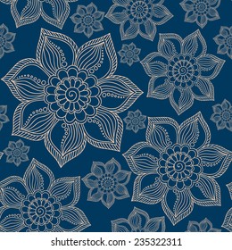 Henna Mehendi Tattoo Doodles Seamless Pattern on a blue background