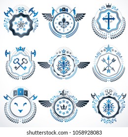 Heraldic decorative emblems made with royal crowns, animal illustrations, religious crosses, armory and medieval castles. Collection of symbols in vintage style.
