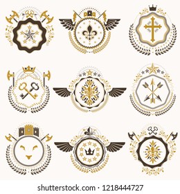 Heraldic decorative emblems made with royal crowns, animal illustrations, religious crosses, armory and medieval castles. Collection of symbols in vintage style.