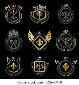Heraldic decorative emblems made with royal crowns, animal illustrations, religious crosses, armory and medieval castles. Collection of symbols in vintage style.