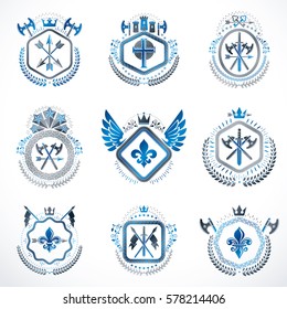 Heraldic decorative emblems made with royal crowns, animal illustrations, religious crosses, armory and medieval castles. Collection of symbols in vintage style.