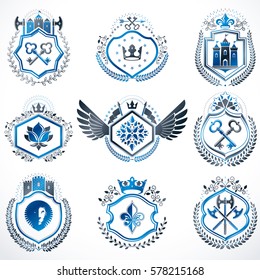 Heraldic decorative emblems made with royal crowns, animal illustrations, religious crosses, armory and medieval castles. Collection of symbols in vintage style.