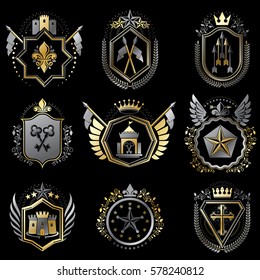 Heraldic decorative emblems made with royal crowns, animal illustrations, religious crosses, armory and medieval castles. Collection of symbols in vintage style.