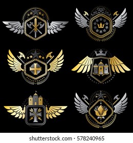 Heraldic decorative emblems made with royal crowns, animal illustrations, religious crosses, armory and medieval castles. Collection of symbols in vintage style.