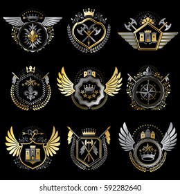 Heraldic decorative emblems made with royal crowns, animal illustrations, religious crosses, armory and medieval castles. Collection of symbols in vintage style.