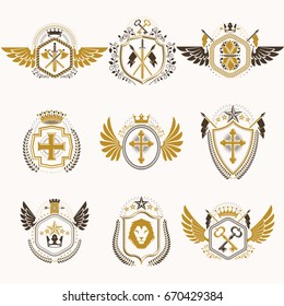 Heraldic decorative emblems made with royal crowns, animal illustrations, religious crosses, armory and medieval castles. Collection of symbols in vintage style.