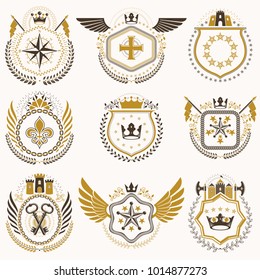 Heraldic emblems with wings isolated on white backdrop. Collection of vector symbols in vintage style created using heraldry elements like crowns, towers, crosses and armory.