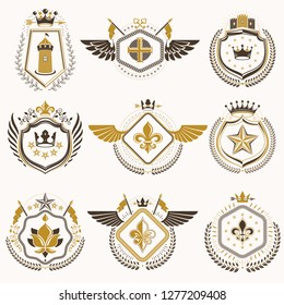 Heraldic emblems with wings isolated on white backdrop. Collection of vector symbols in vintage style created using heraldry elements like crowns, towers, crosses and armory.