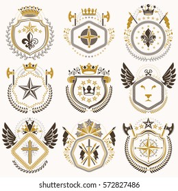 Heraldic emblems with wings isolated on white backdrop. Collection of vector symbols in vintage style created using heraldry elements like crowns, towers, crosses and armory.