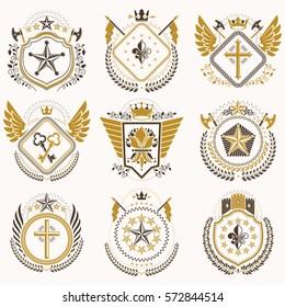 Heraldic emblems with wings isolated on white backdrop. Collection of vector symbols in vintage style created using heraldry elements like crowns, towers, crosses and armory.