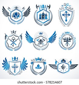 Heraldic emblems with wings isolated on white backdrop. Collection of vector symbols in vintage style created using heraldry elements like crowns, towers, crosses and armory.