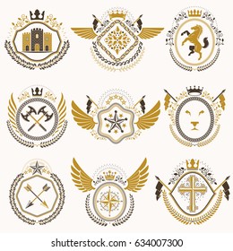 Heraldic emblems with wings isolated on white backdrop. Collection of vector symbols in vintage style created using heraldry elements like crowns, towers, crosses and armory.