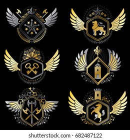 Heraldic emblems with wings isolated on white backdrop. Collection of vector symbols in vintage style created using heraldry elements like crowns, towers, crosses and armory.