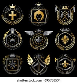 Heraldic emblems with wings isolated on white backdrop. Collection of vector symbols in vintage style created using heraldry elements like crowns, towers, crosses and armory.