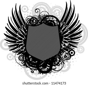 An heraldic shield or badge, blank so you can add your own images