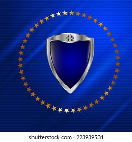 The heraldic shield on blue abstract background