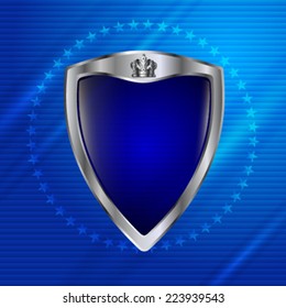 The heraldic shield on blue abstract background