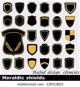 Heraldic shields . Vector Set of retro badges, labels,  and design elements.