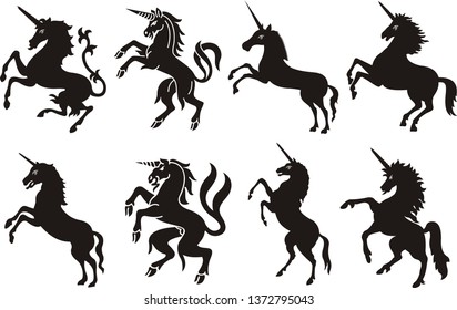 Heraldic unicorn silhouettes. Vector