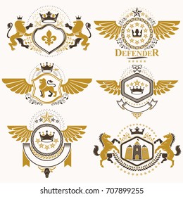 Heraldic vector signs decorated with vintage elements, monarch crowns, religious crosses, armory and animals. Set of classy symbolic graphic insignias with bird wings.