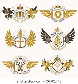 Heraldic vector signs decorated with vintage elements, monarch crowns, religious crosses, armory and animals. Set of classy symbolic graphic insignias with bird wings.