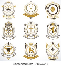 Heraldic vector signs decorated with vintage elements, monarch crowns, religious crosses, armory and animals. Set of classy symbolic graphic insignias.