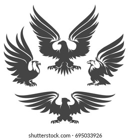 Heraldry eagles, hawks and falcons drawn in tattoo style. Vector illustration