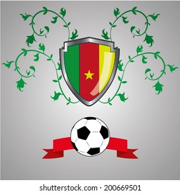 a heraldry shield with the flag of cameroon, a ribbon and a soccer ball