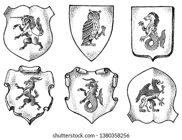 Heraldry in vintage style. Engraved coat of arms with animals, birds, mythical creatures, fish. Medieval Emblems and the logo of the fantasy kingdom.