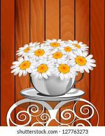 Herbal chamomile in a white cup. Greeting card