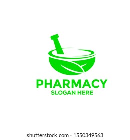 herbal logo vector graphic with an icon that consist of mortar, pestle and leaf, Pharmacy logo vector template