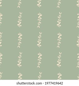 Herbal seamless pattern with botanical eucalyptus ornament. Light green background. Spring style. Graphic design for wrapping paper and fabric textures. Vector Illustration.