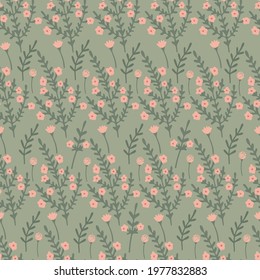 Herbal seamless pattern with wild or meadow flowers on green background. Summer floral print. Great textile for throw pillow, phone cases, bed linens, wallpaper.