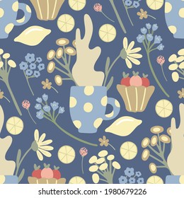 Herbal tea seamless pattern with lemons, fruit desserts, wild flowers and mugs of tea on blue background. Summer morning mood. Great textile for throw pillow, phone cases, bed linens, wallpaper.