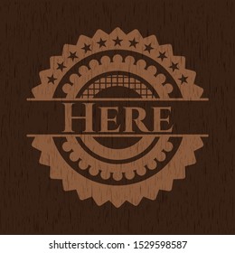 Here badge with wood background